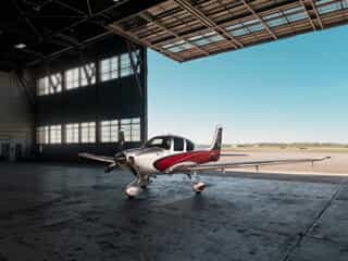 photo of Ron Wright's personal aircraft, parked in the hanger